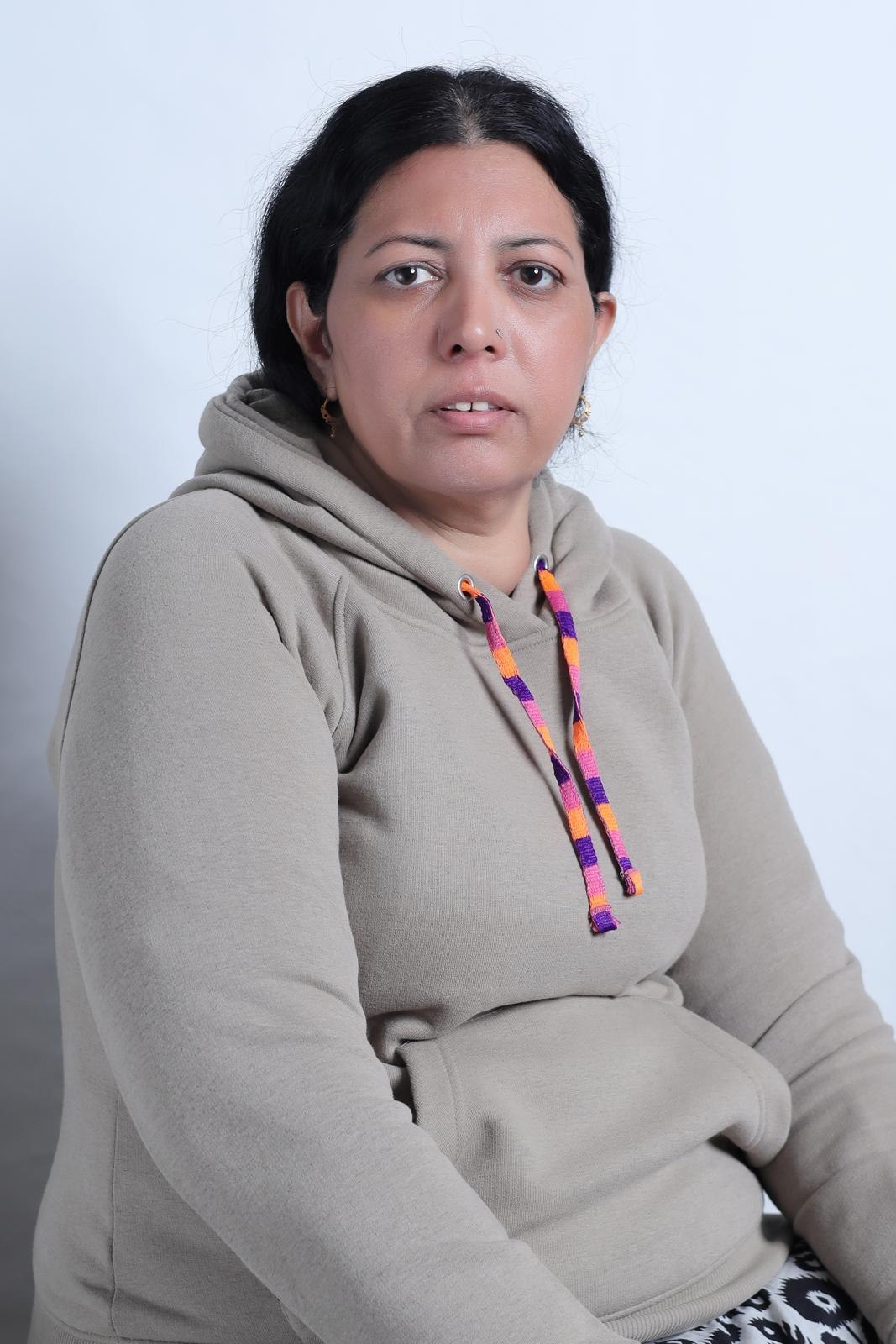 Mrs Farzana, Director
